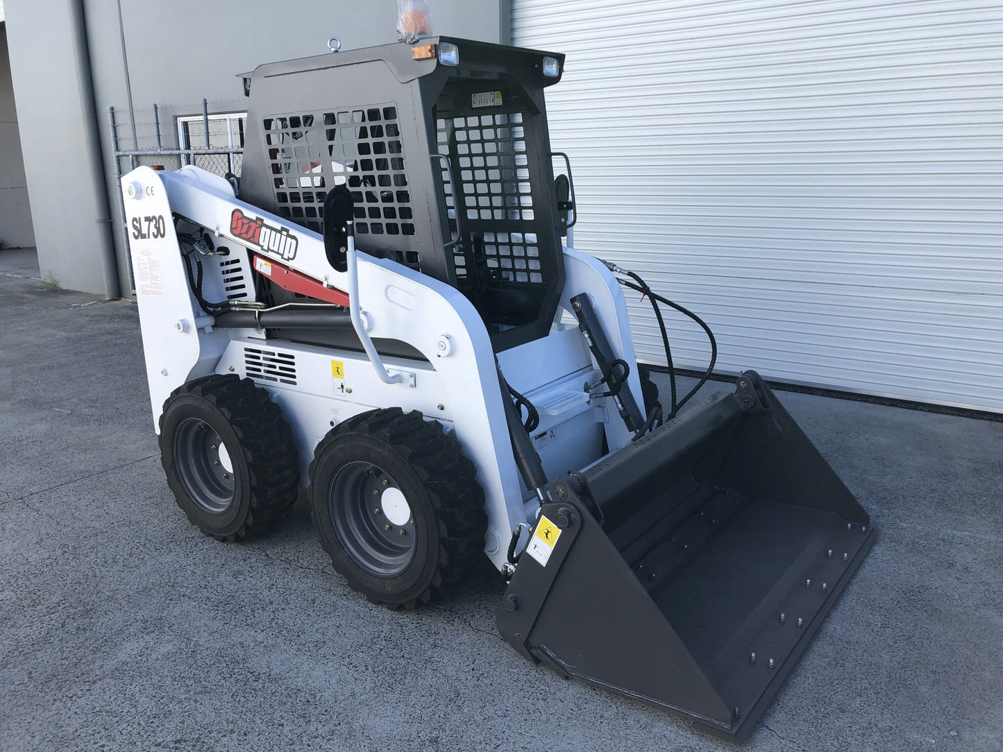 Bobcat Hitch Skid Steer SL730 by Ozziquip with 4 in 1 Bucket image 1