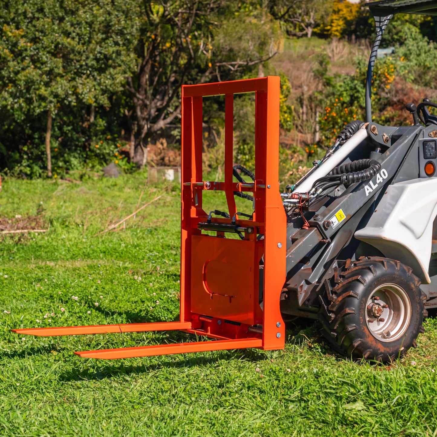 Side-Shift Flip-Up Pallet Forks for Mini Loaders