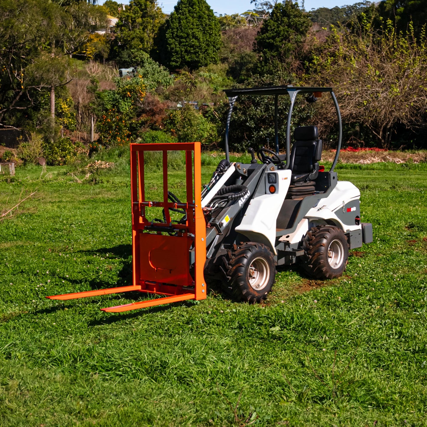 Side-Shift Flip-Up Pallet Forks for Mini Loaders